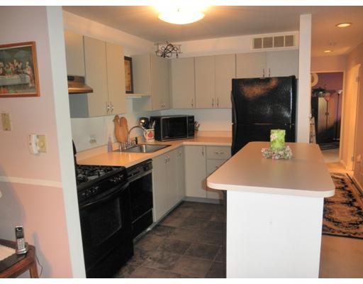 2305 Kenzie Road Pittsburgh, PA 15205 - Photo 5 of 15 Kitchen. Kitchen includes 4-burner gas stove, refrigerator, dishwasher, disposal, ceramic tile floor and functional island.