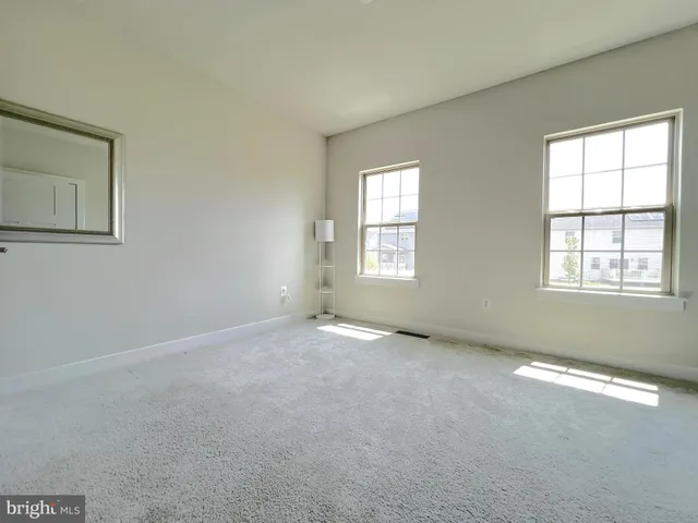 a bathroom with a toilet sink and shower