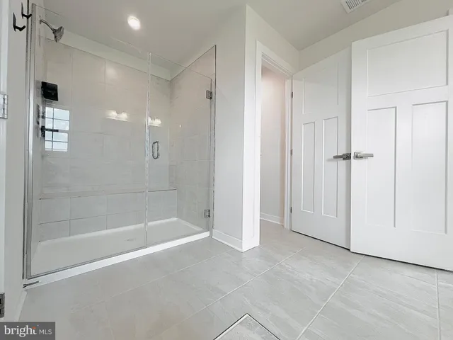 a view of a room with racks on the wall