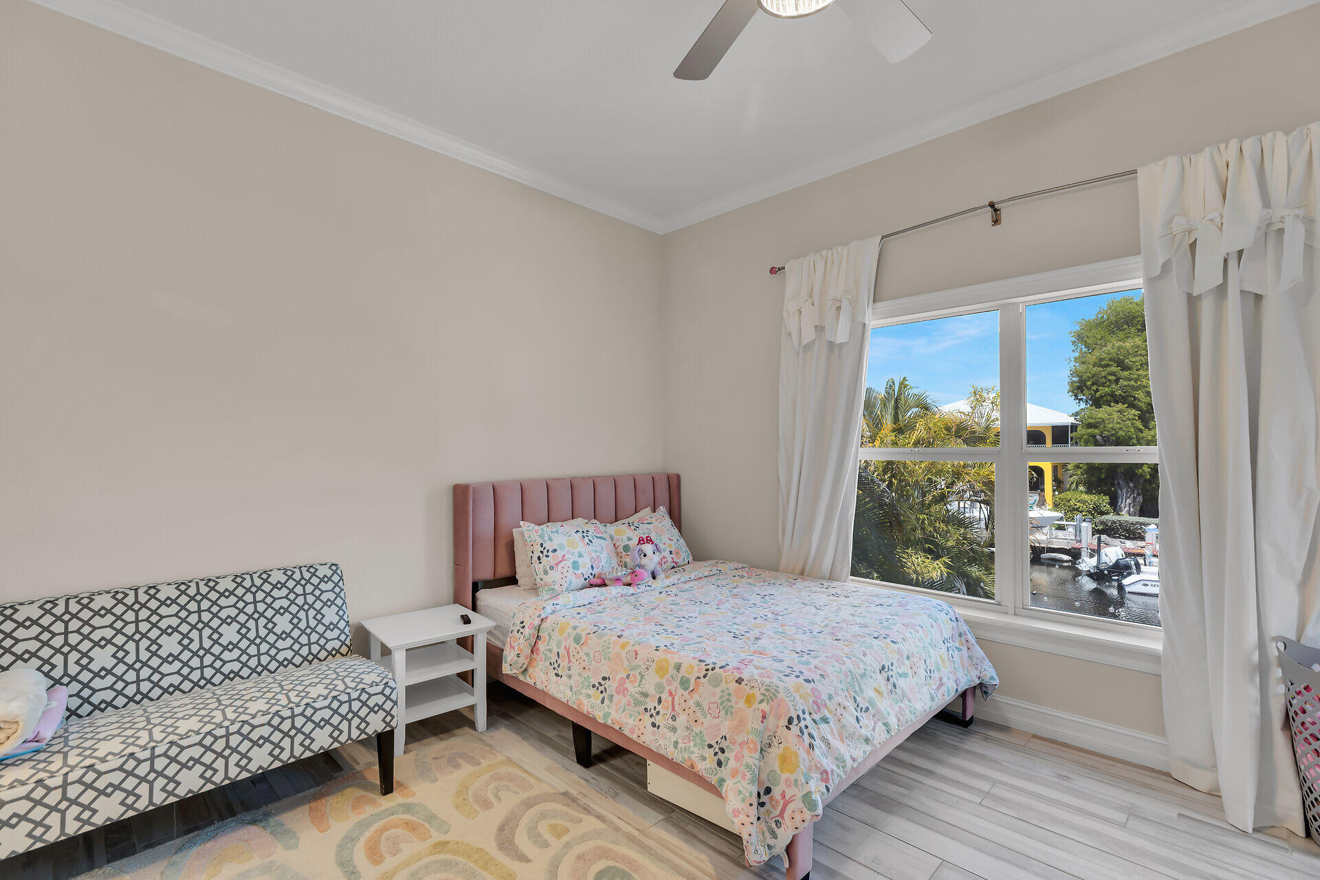 853 Ellen Drive Key Largo, FL 33037 - Photo 25 of 42 a bedroom with a bed couch and window
