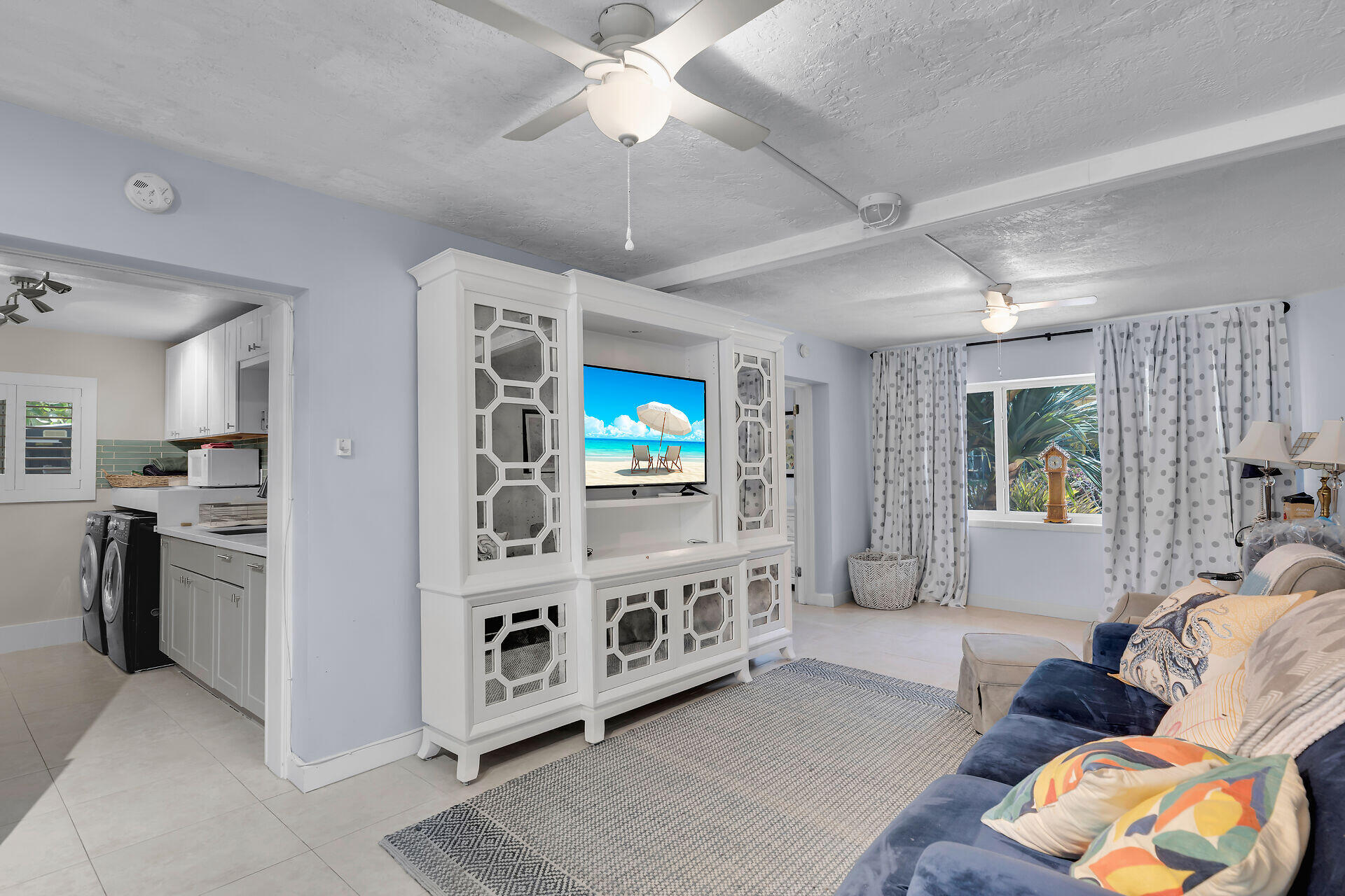 853 Ellen Drive Key Largo, FL 33037 - Photo 27 of 42 a living room with furniture and a flat screen tv