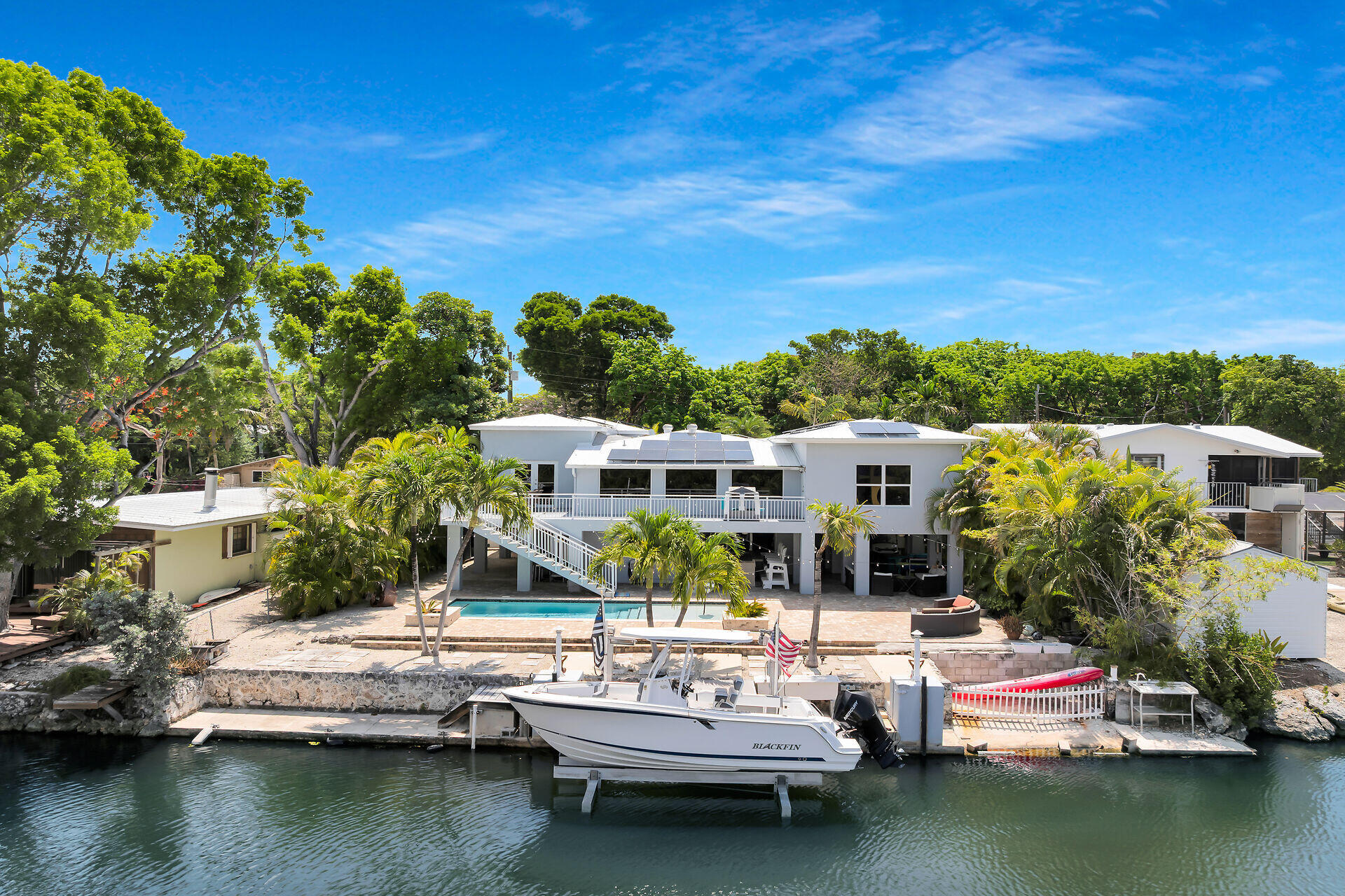 853 Ellen Drive Key Largo, FL 33037 - Photo 35 of 42 a view of house with swimming pool and outdoor seating