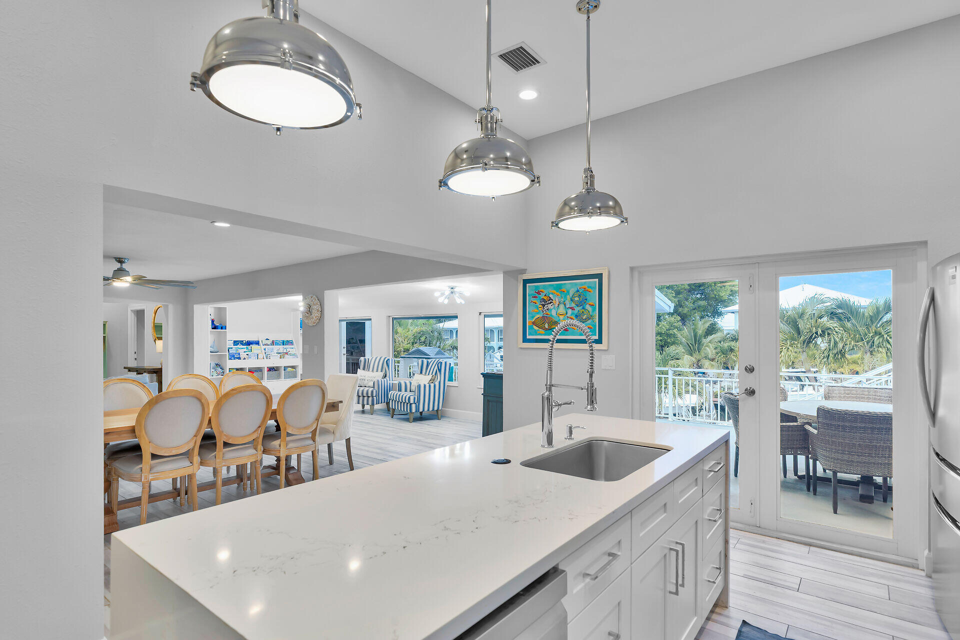 853 Ellen Drive Key Largo, FL 33037 - Photo 5 of 42 a view of a dining room and furniture window and outside view