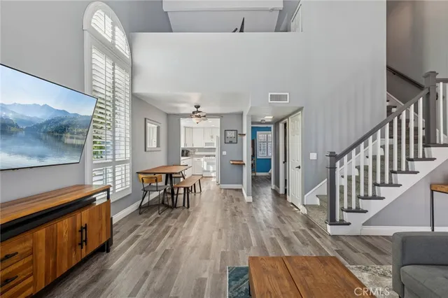 a view of dining room with furniture and wooden floor