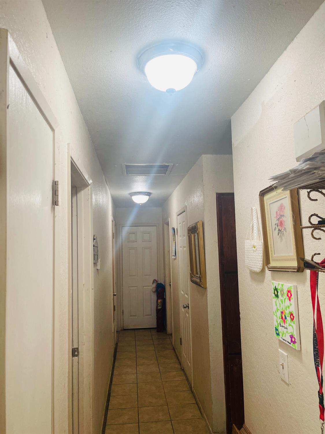 17260 Rodeo Drive Madera, CA 93638 - Photo 11 of 19 a view of a hallway with elevator
