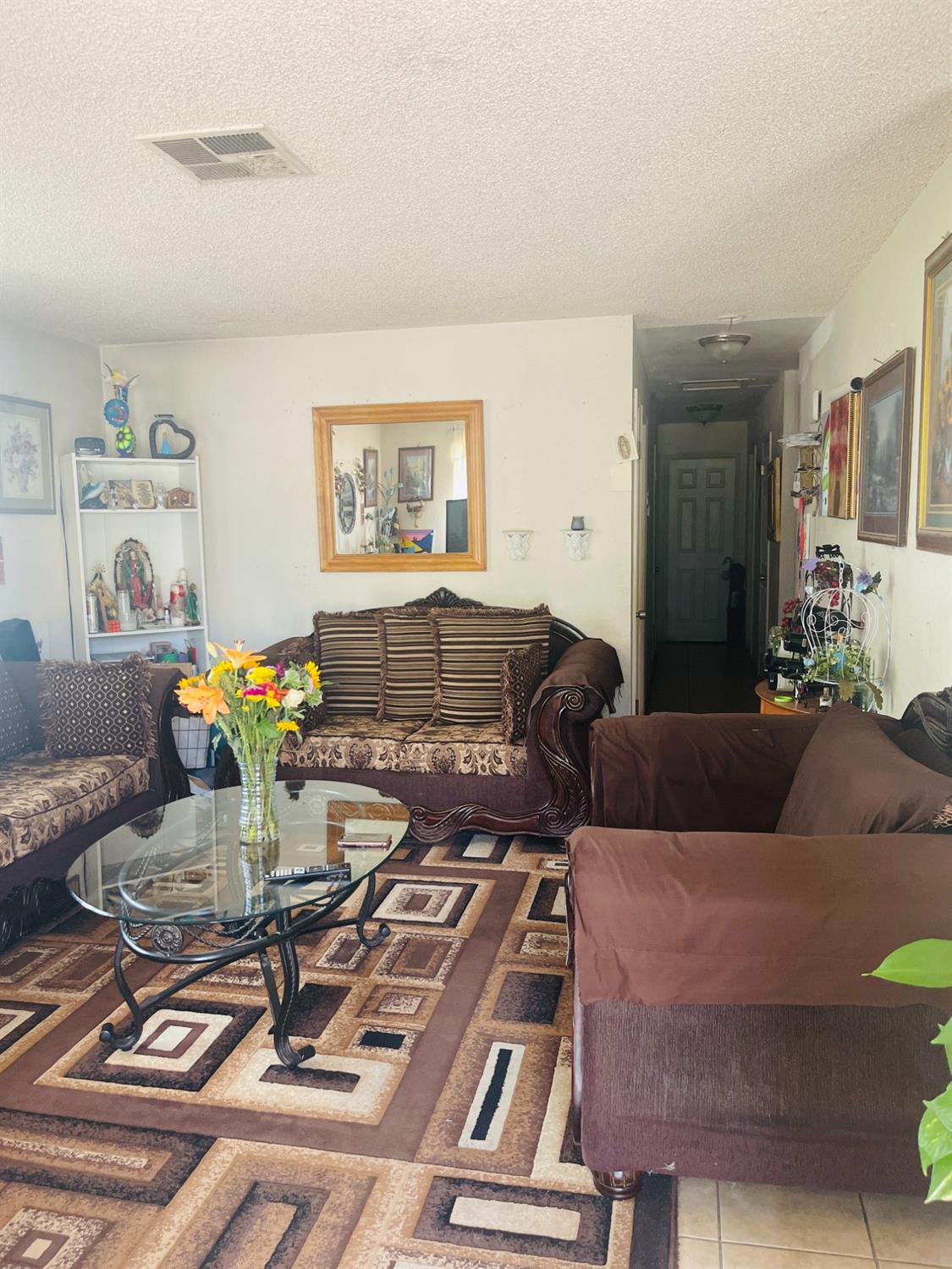 17260 Rodeo Drive Madera, CA 93638 - Photo 5 of 19 a living room with furniture and wooden floor