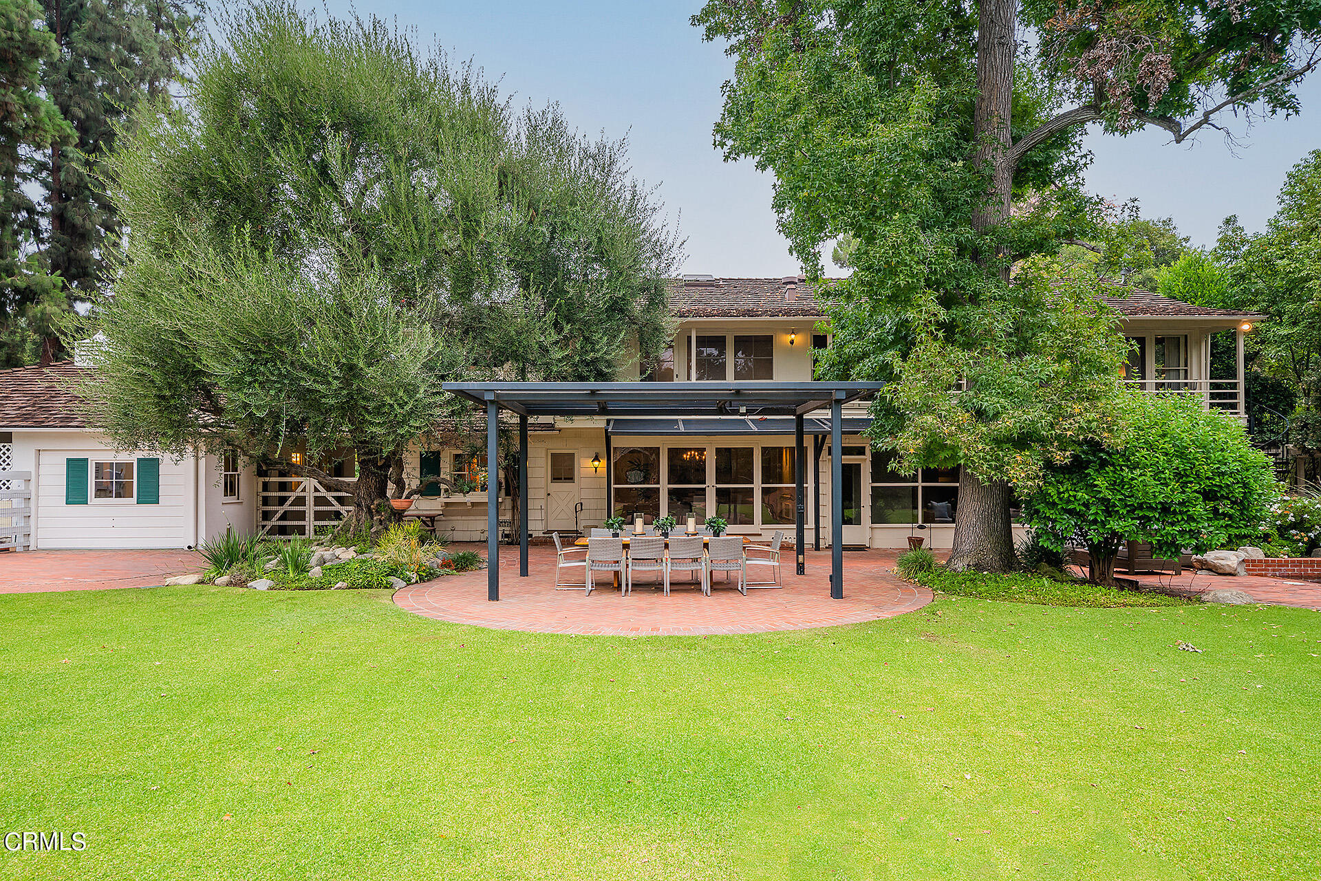 2035 South Oak Knoll Avenue San Marino, CA 91108 - Photo 22 of 28 a view of house with a backyard and a patio