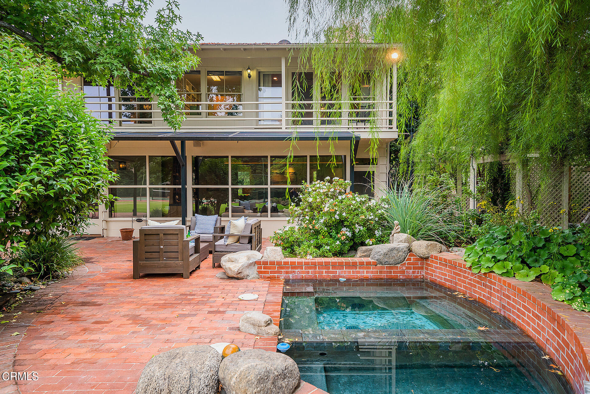 2035 South Oak Knoll Avenue San Marino, CA 91108 - Photo 23 of 28 a backyard of a house with yard and outdoor seating