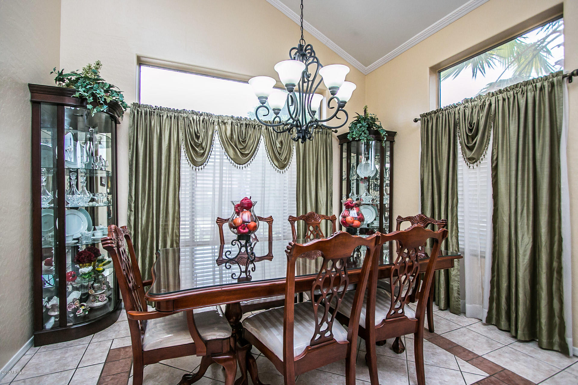 618 East Ranch Road Gilbert, AZ 85296 - Photo 4 of 32 a view of a dining room with furniture and chandelier