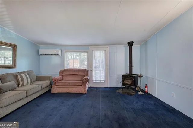 a living room with furniture and a couch