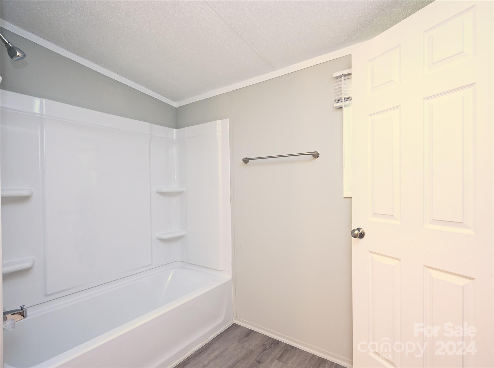 2574 Orchard Road Smyrna, SC 29743 - Photo 12 of 17 a bathroom with a bathtub and a shower
