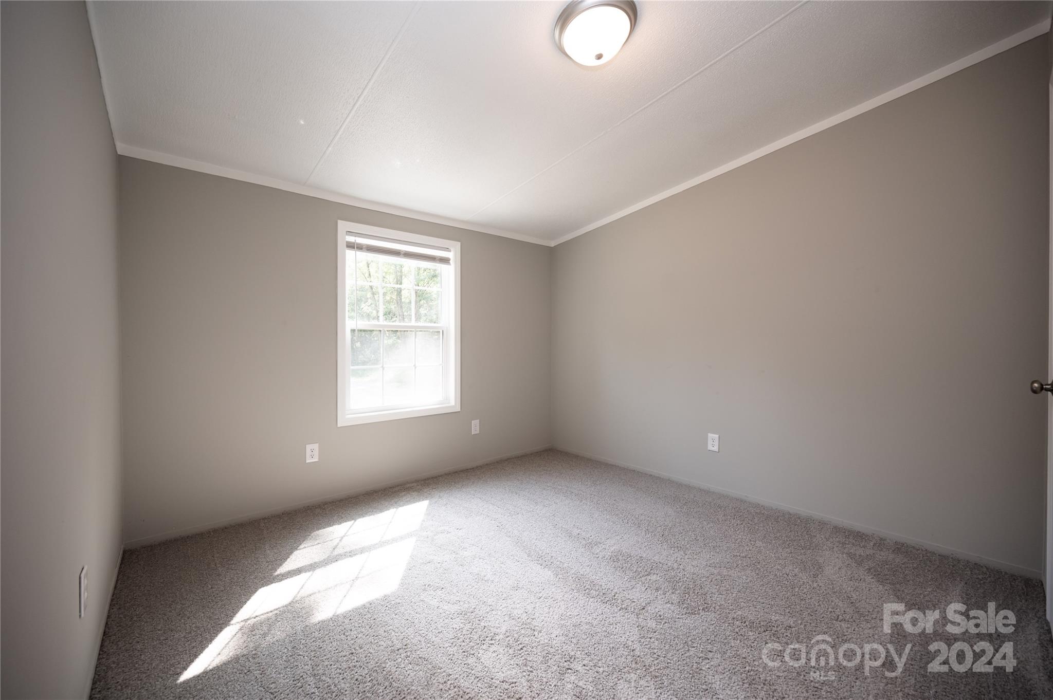 2574 Orchard Road Smyrna, SC 29743 - Photo 13 of 17 an empty room with windows