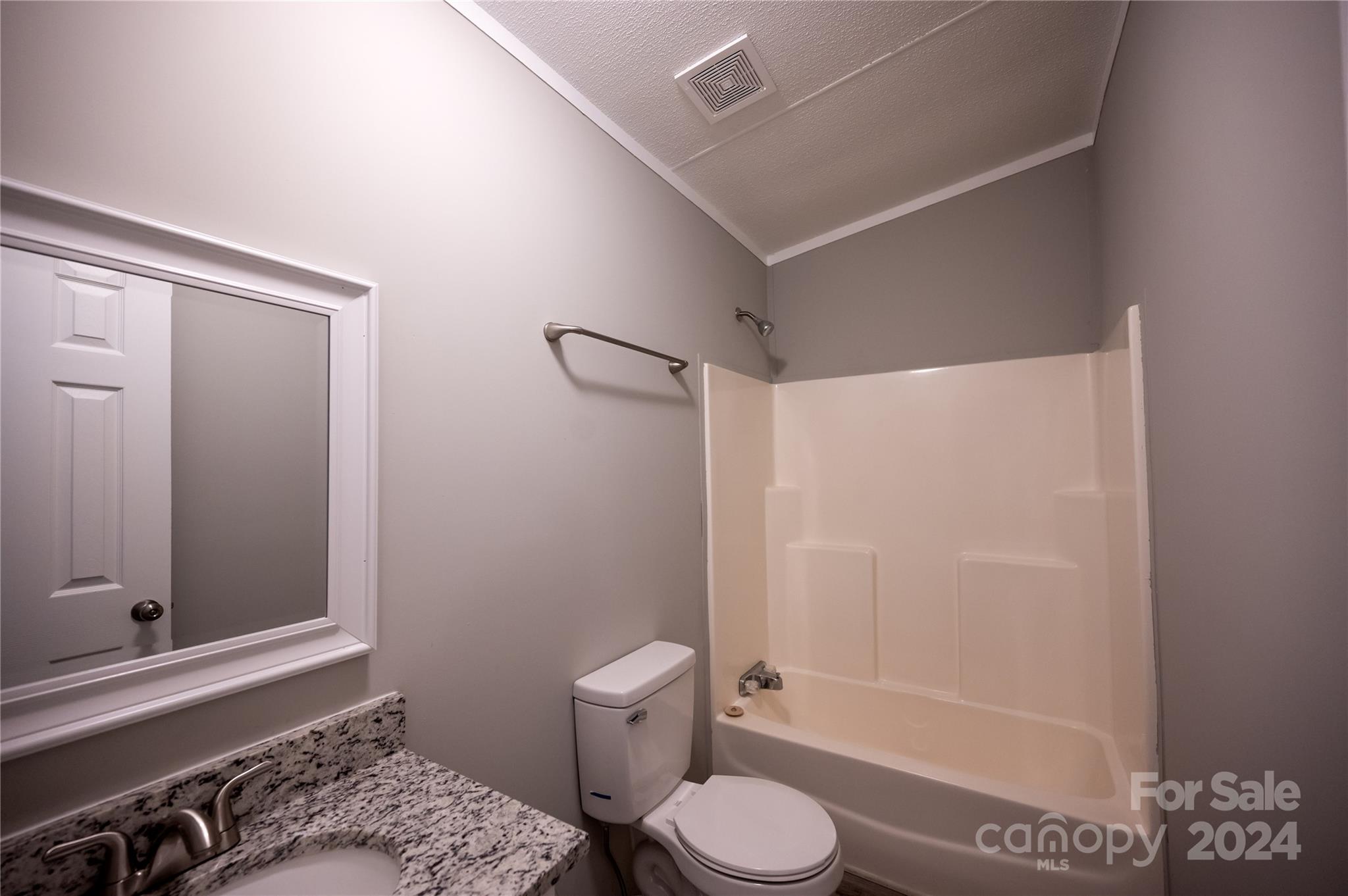 2574 Orchard Road Smyrna, SC 29743 - Photo 15 of 17 a bathroom with a sink a toilet and shower