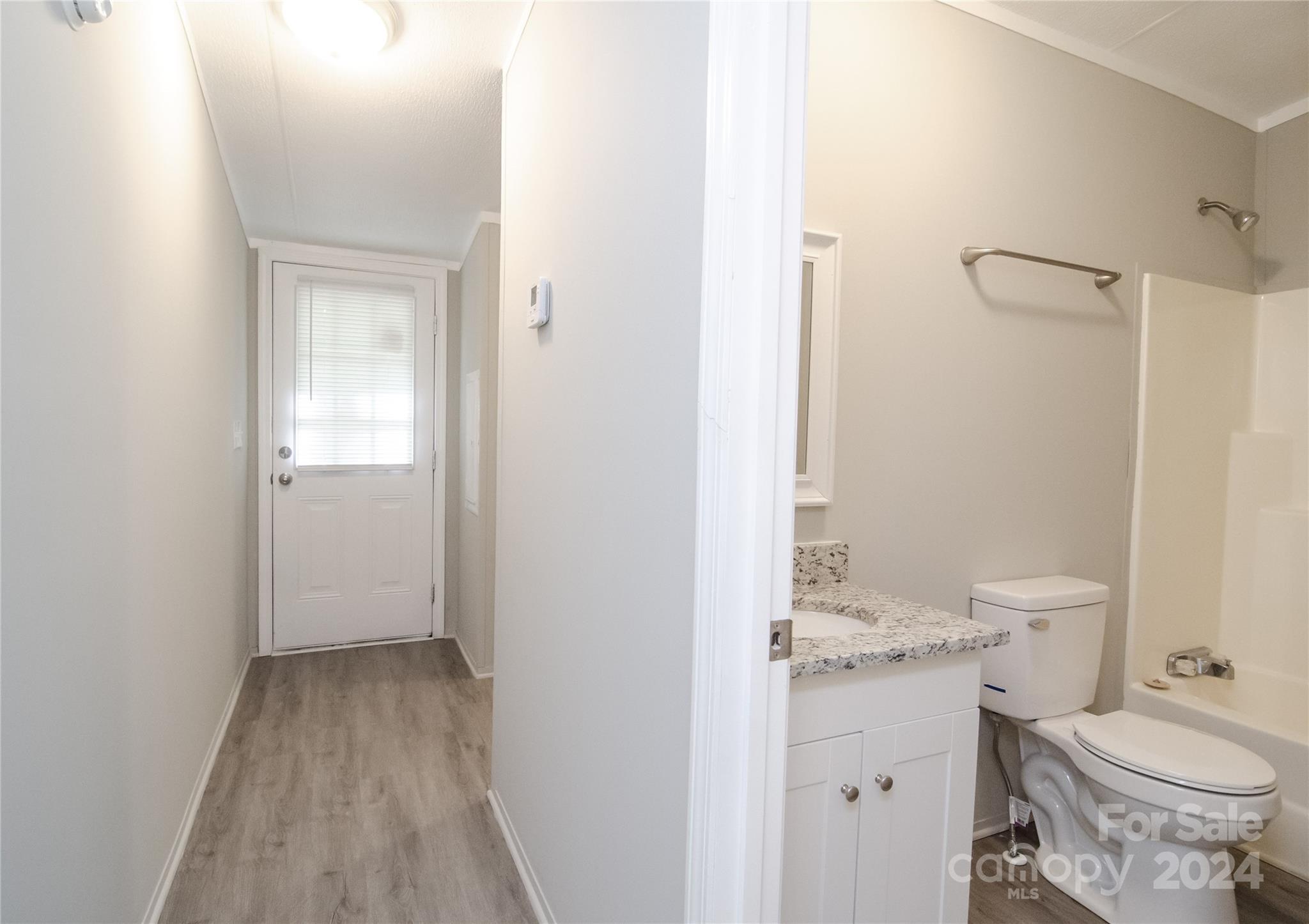 2574 Orchard Road Smyrna, SC 29743 - Photo 16 of 17 a bathroom with a sink toilet and shower