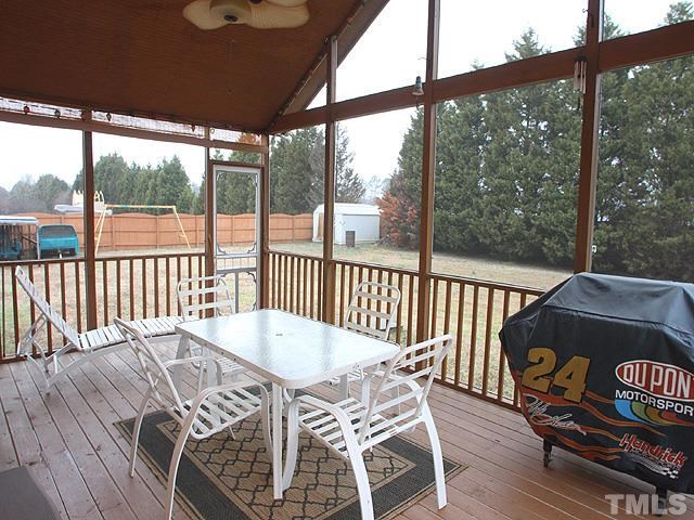1017 Holland Ridge Drive Raleigh, NC 27603 - Photo 21 of 24 a view of balcony with wooden floor