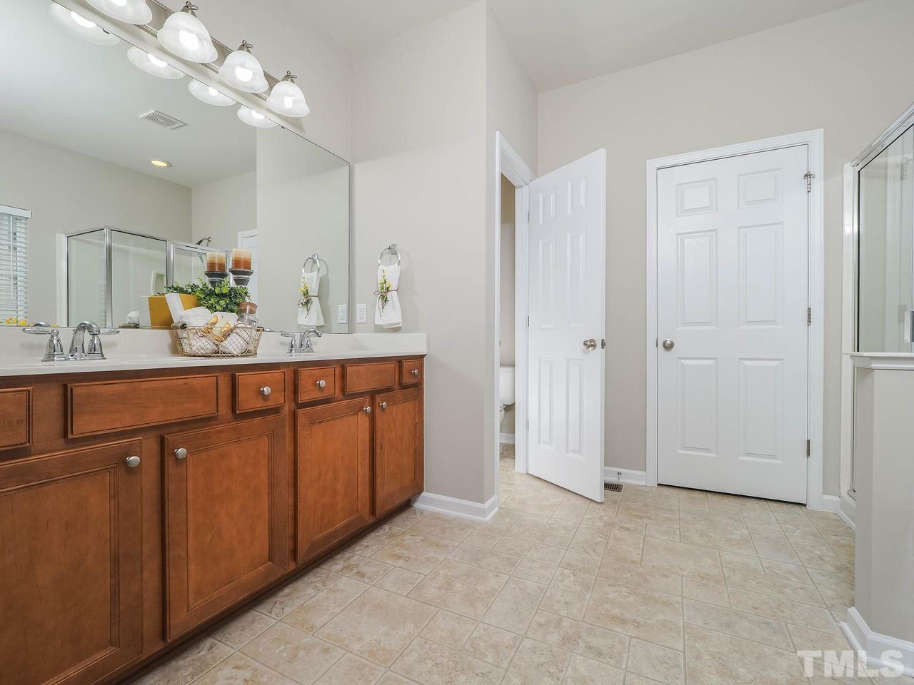 895 Seastone Street Raleigh, NC 27603 - Photo 7 of 15 Spacious bathroom. Relax in a bubble bath after a long day!