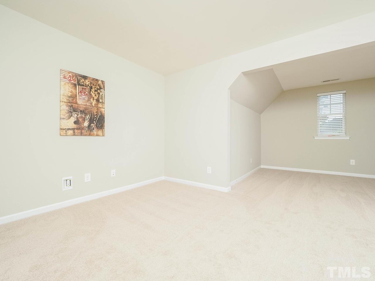 895 Seastone Street Raleigh, NC 27603 - Photo 8 of 15 Table Tennis anyone? Oversized room that is perfect for fun gatherings!