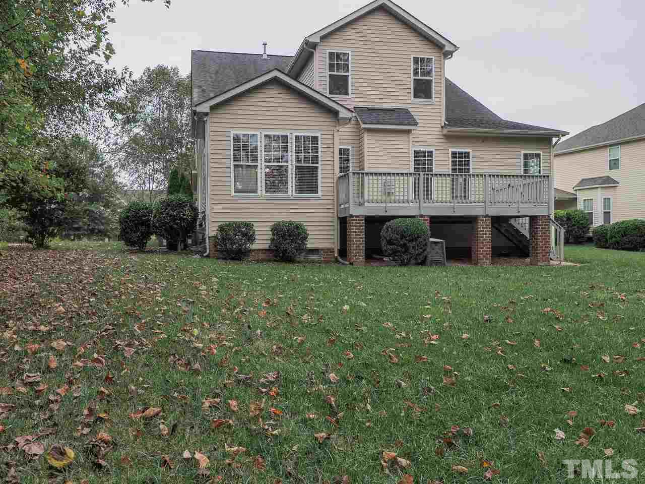 895 Seastone Street Raleigh, NC 27603 - Photo 10 of 15 Large backyard with views of the golf course