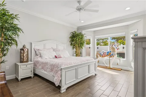 a bathroom with a sink mirror and toilet