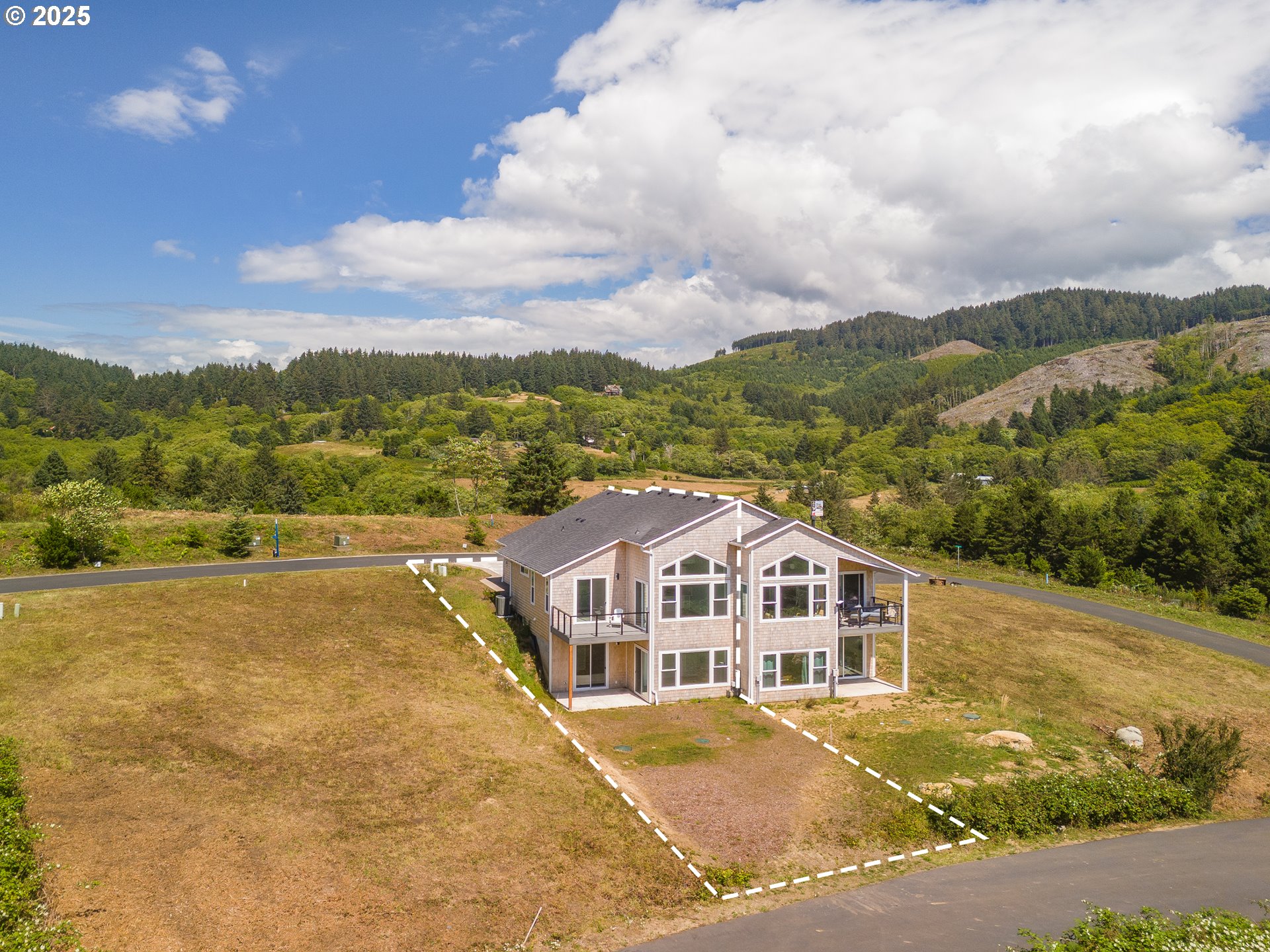 6485 Heron View Neskowin, OR 97149 - Photo 13 of 46 a view of a city with mountains in the background