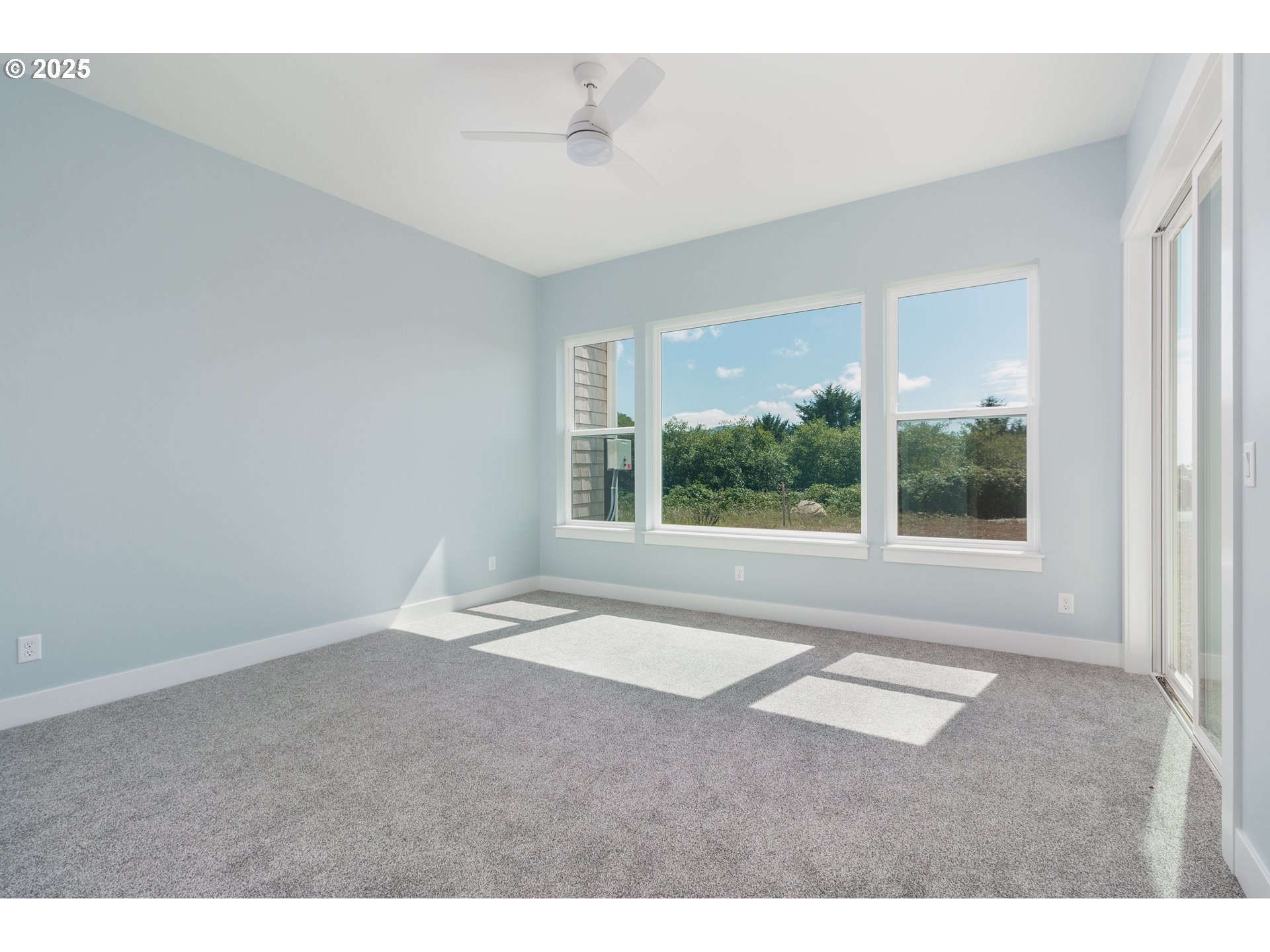 6485 Heron View Neskowin, OR 97149 - Photo 18 of 46 a view of an empty room with a window
