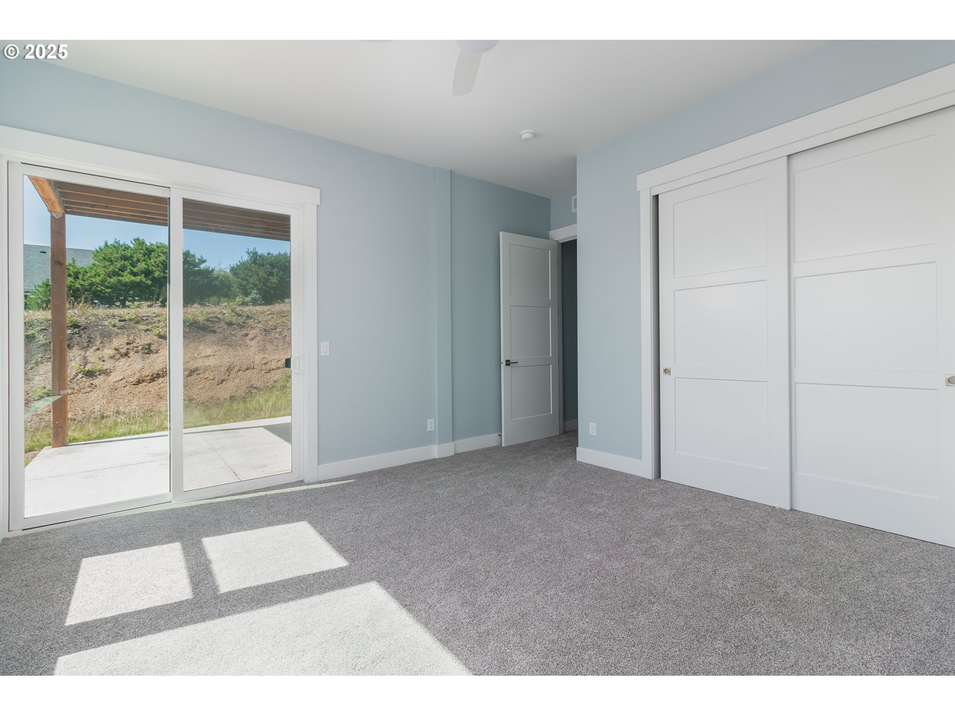 6485 Heron View Neskowin, OR 97149 - Photo 19 of 46 a view of an empty room and window