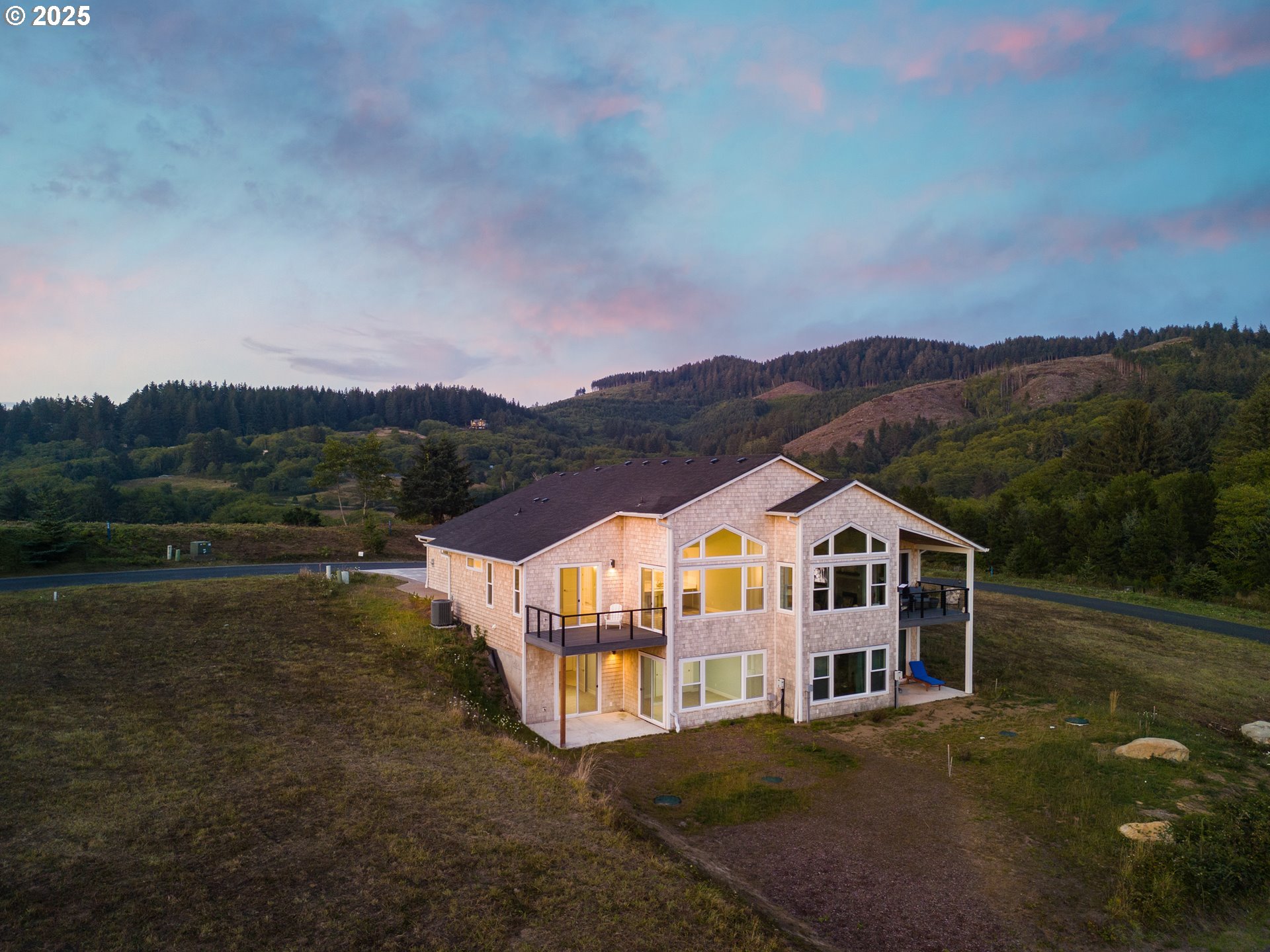 6485 Heron View Neskowin, OR 97149 - Photo 35 of 46 a view of houses with sky view