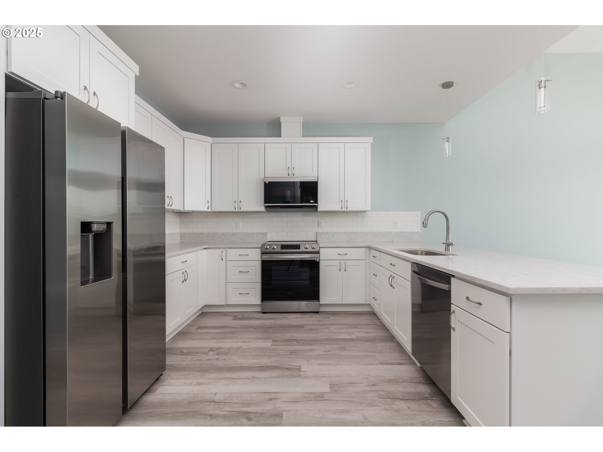 6485 Heron View Neskowin, OR 97149 - Photo 7 of 46 a kitchen with a refrigerator sink and microwave