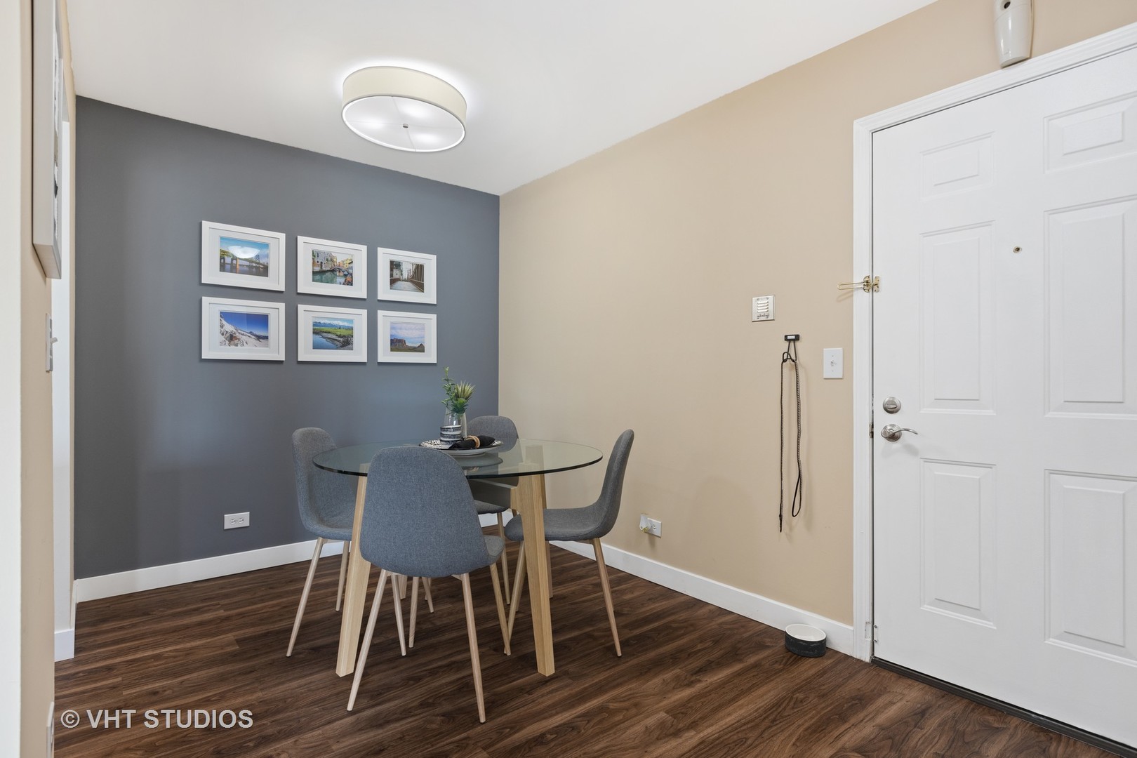30 Sterling Circle, Unit 201 Wheaton, IL 60189 - Photo 12 of 40 a view of a dining room with furniture and wooden floor