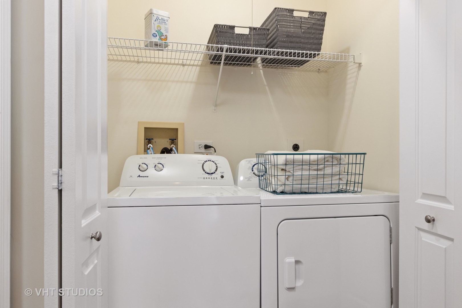 30 Sterling Circle, Unit 201 Wheaton, IL 60189 - Photo 26 of 40 a utility room with dryer and washer