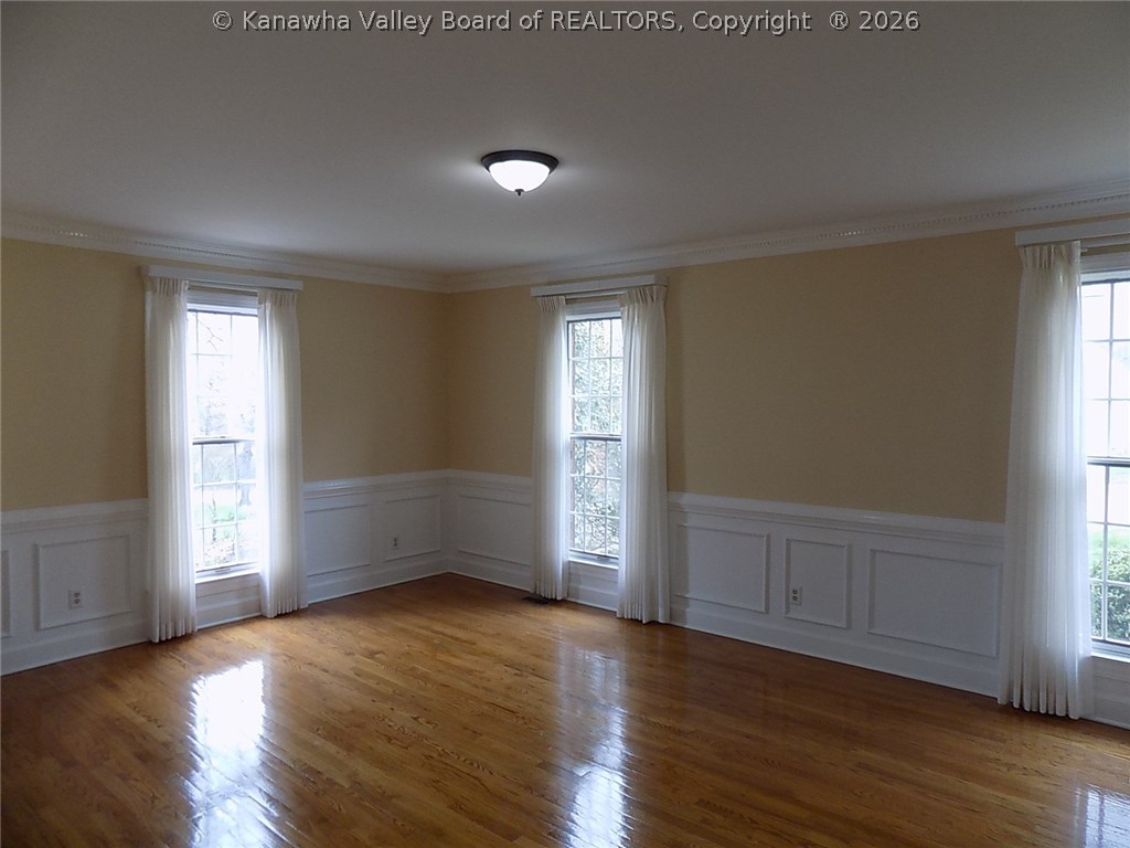 134 East Ridge Road Charleston, WV 25314 - Photo 6 of 30 Plenty of space for all in the formal dining room with custom wainscoting.