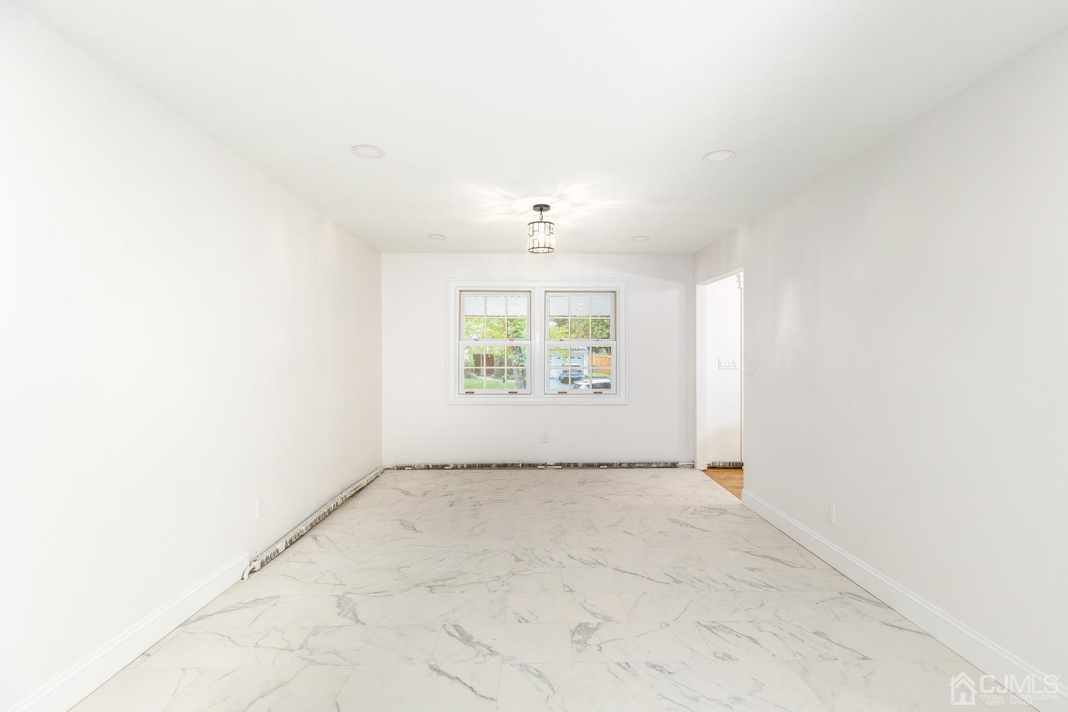 12 Annette Drive Edison, NJ 08820 - Photo 31 of 42 an empty room with windows