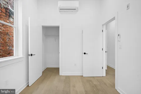 a view of a livingroom with wooden floor
