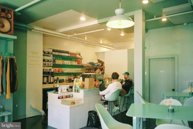 a room with lots of flower plants