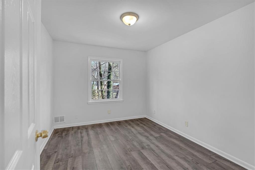 2080 Bluffton Way Decatur, GA 30035 - Photo 25 of 48 an empty room with a window