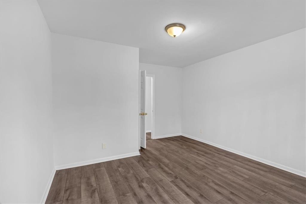2080 Bluffton Way Decatur, GA 30035 - Photo 34 of 48 a view of empty room with wooden floor