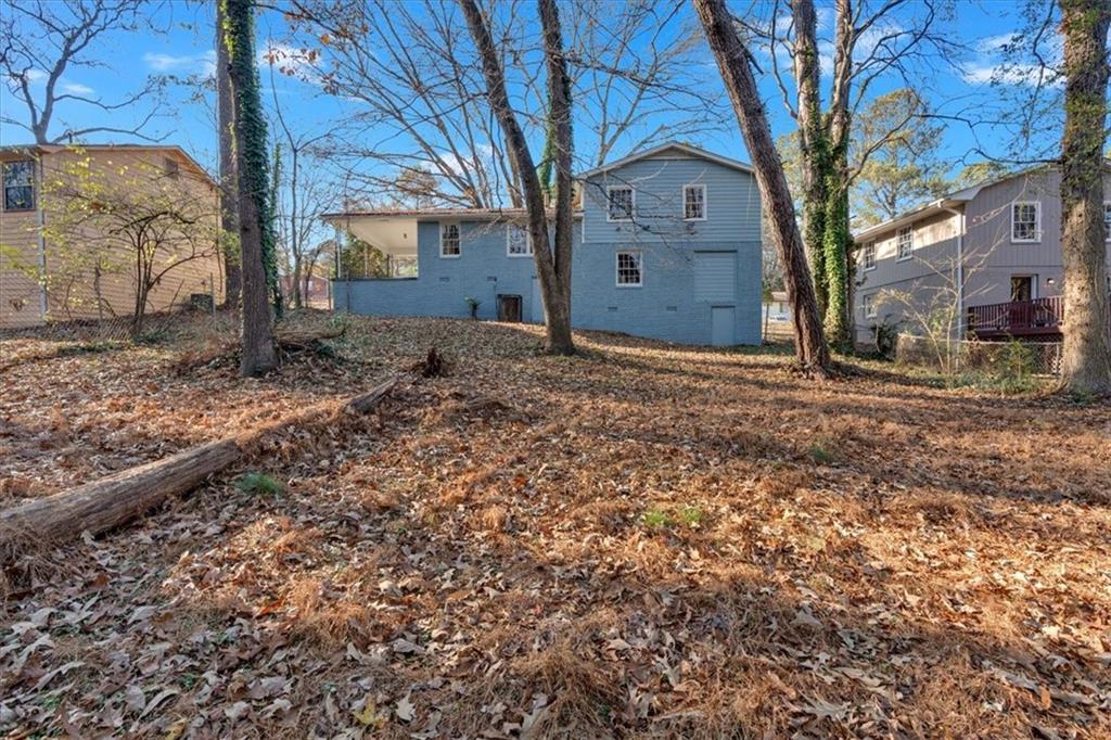 2080 Bluffton Way Decatur, GA 30035 - Photo 42 of 48 a view of a house with a snow in the yard