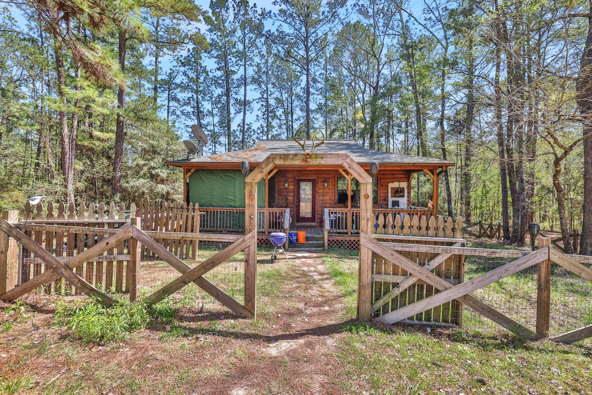 250 Critter Creek Road Coldspring, TX 77331 - Photo 38 of 48 Cabin 3 - 900 SF (occupied). 2 bedroom, 1 full bathroom.