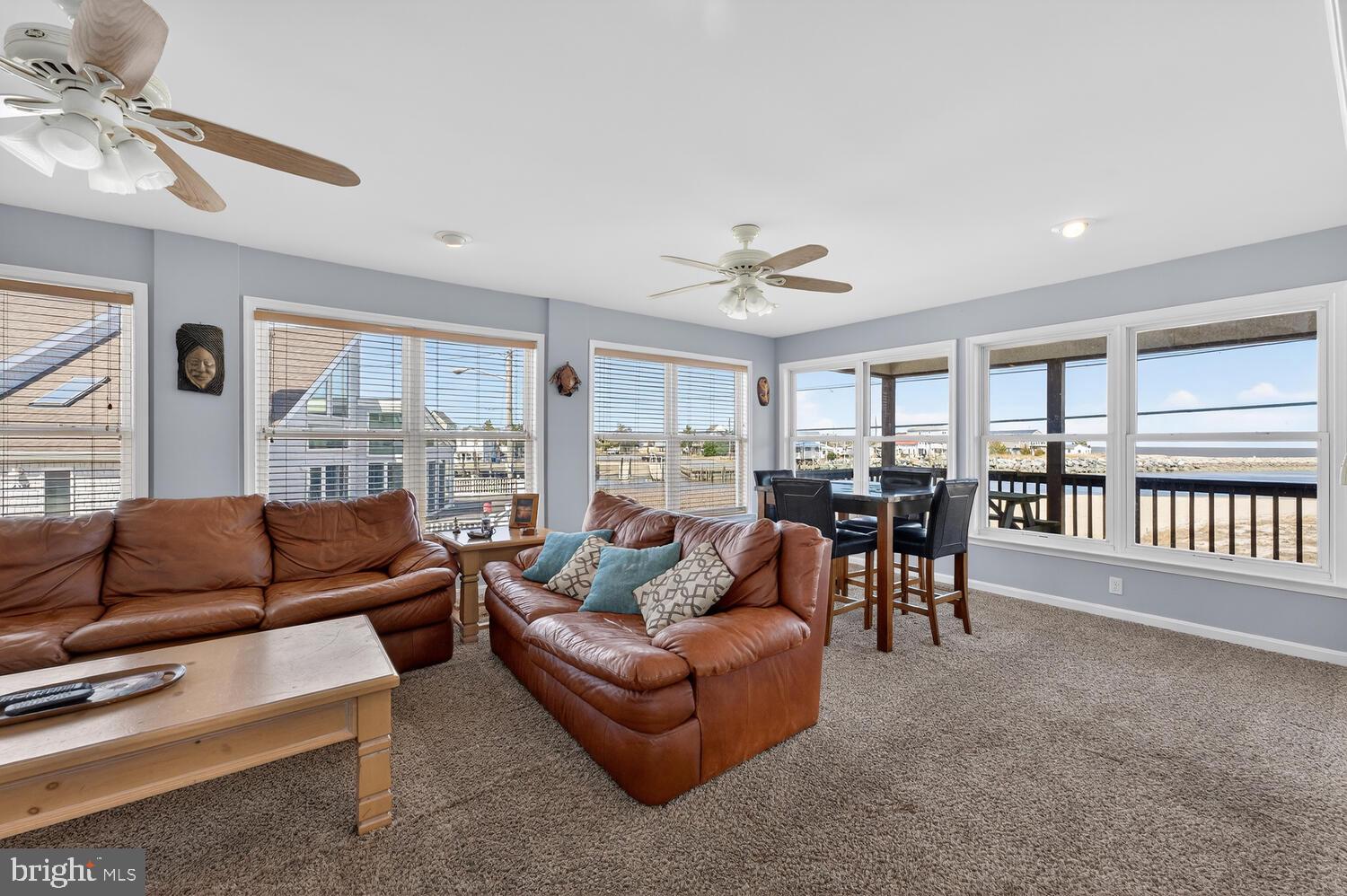 4376 South Bowers Road Milford, DE 19963 - Photo 14 of 46 a living room with furniture and large windows
