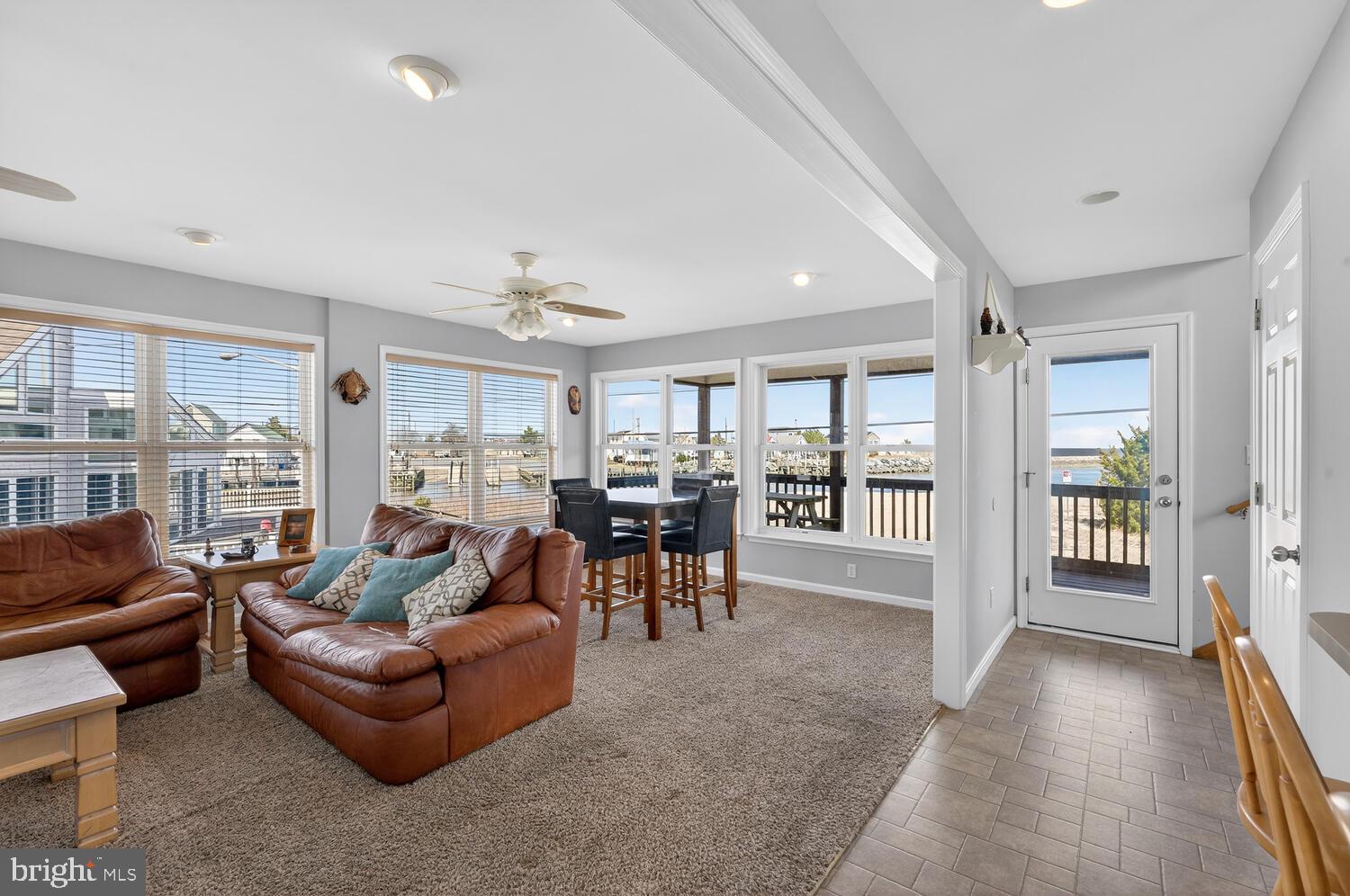 4376 South Bowers Road Milford, DE 19963 - Photo 20 of 46 a living room with furniture and a table