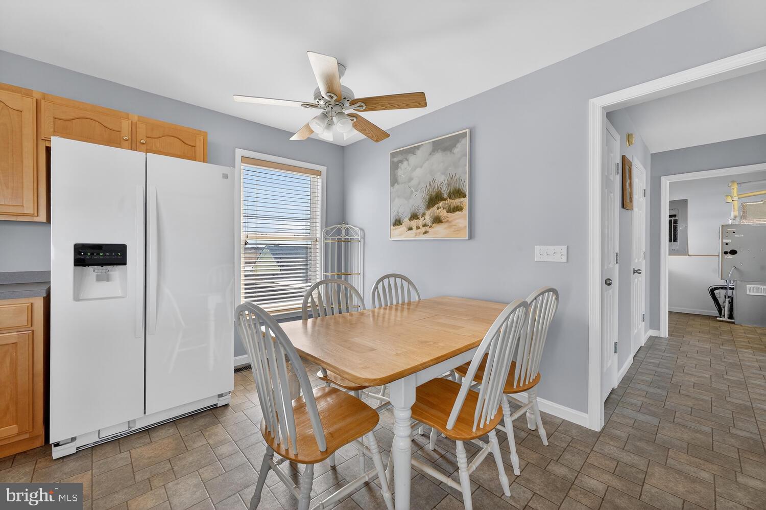 4376 South Bowers Road Milford, DE 19963 - Photo 25 of 46 a view of a dining room with furniture and a window