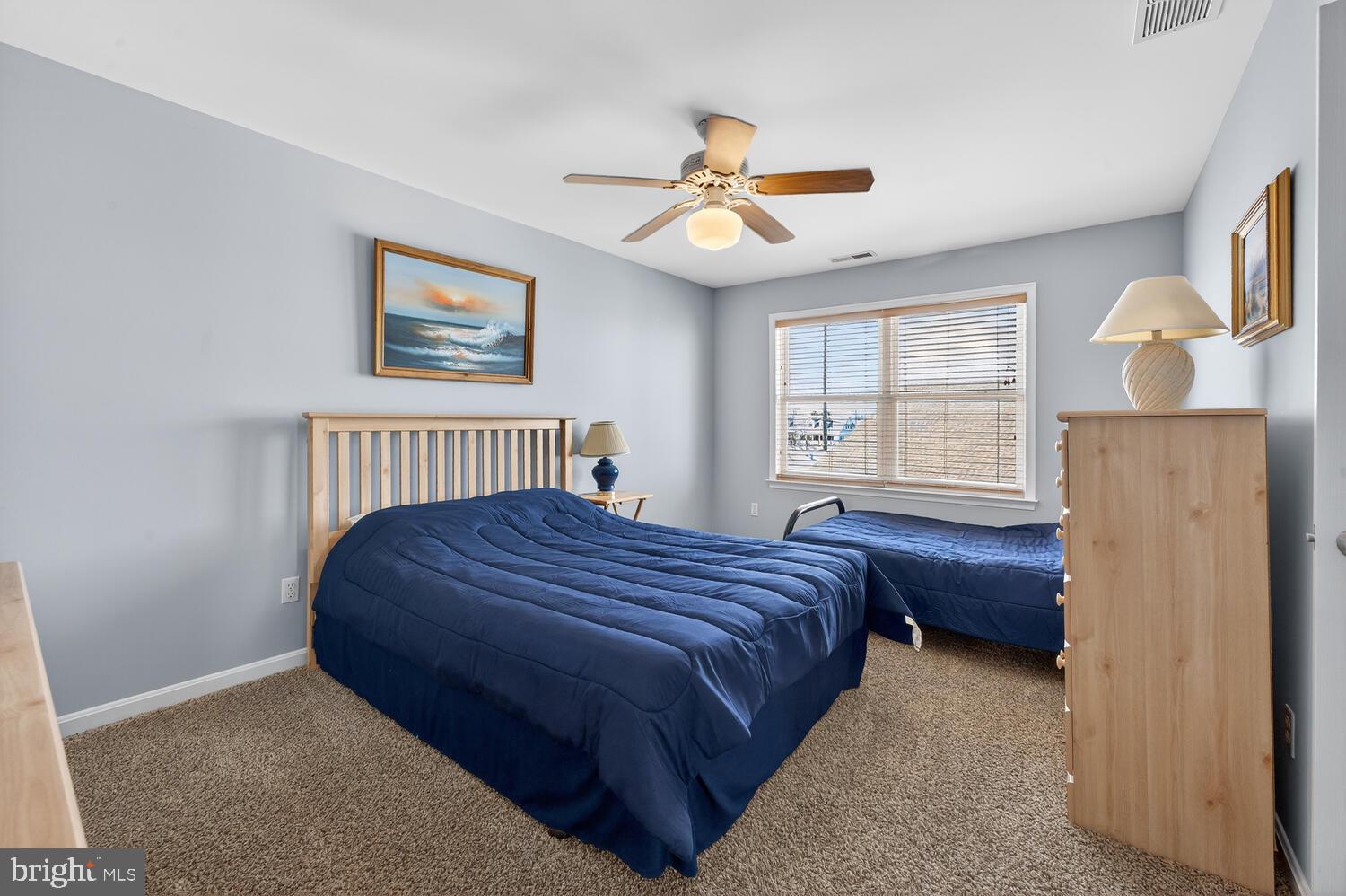 4376 South Bowers Road Milford, DE 19963 - Photo 39 of 46 a bedroom with a bed and window