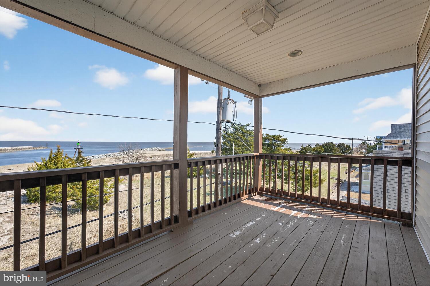 4376 South Bowers Road Milford, DE 19963 - Photo 41 of 46 a view of a balcony with wooden floor
