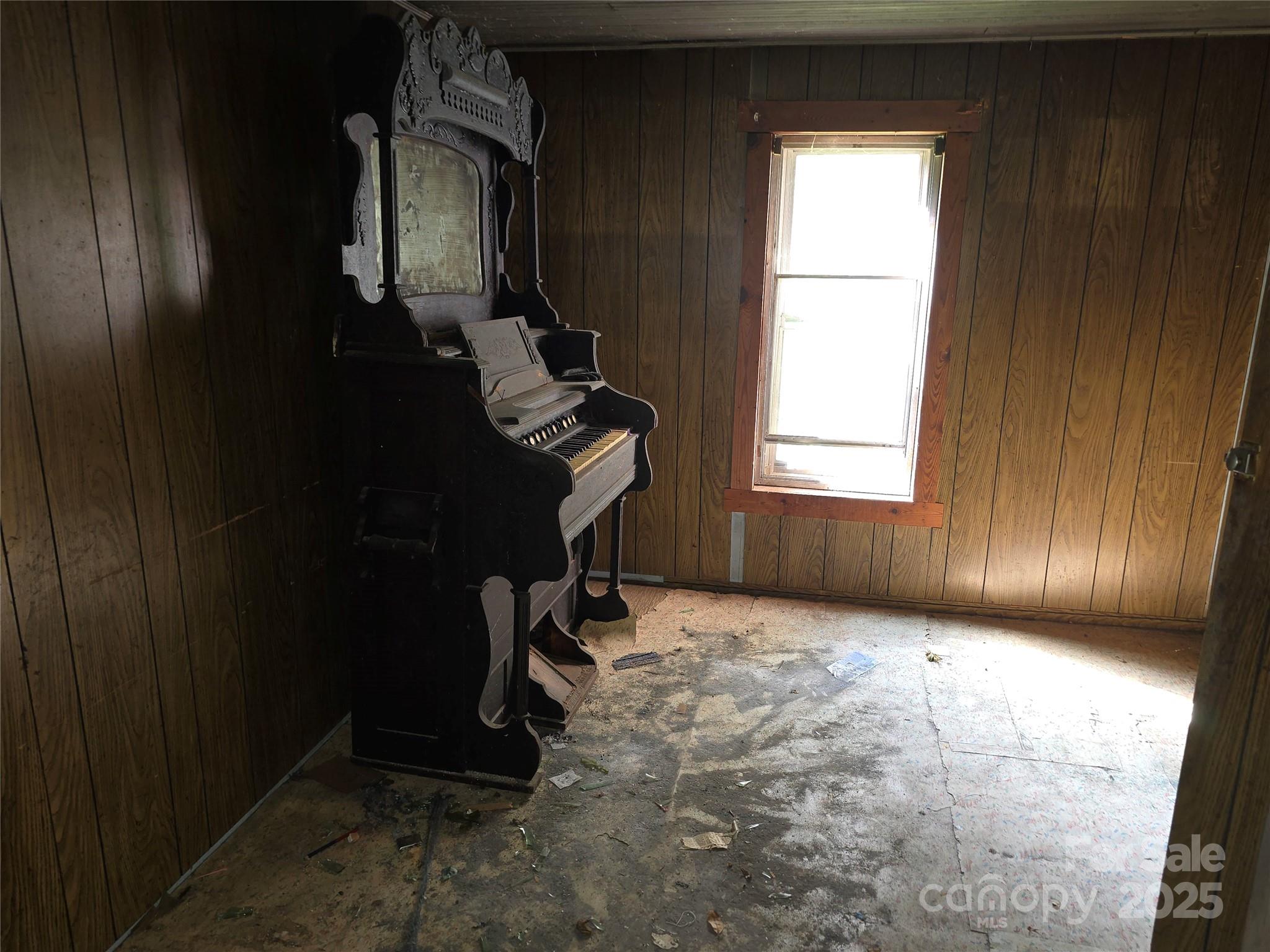 3132 Jones Wade Road Hudson, NC 28638 - Photo 14 of 14 a view of an empty room with wooden floor and windows