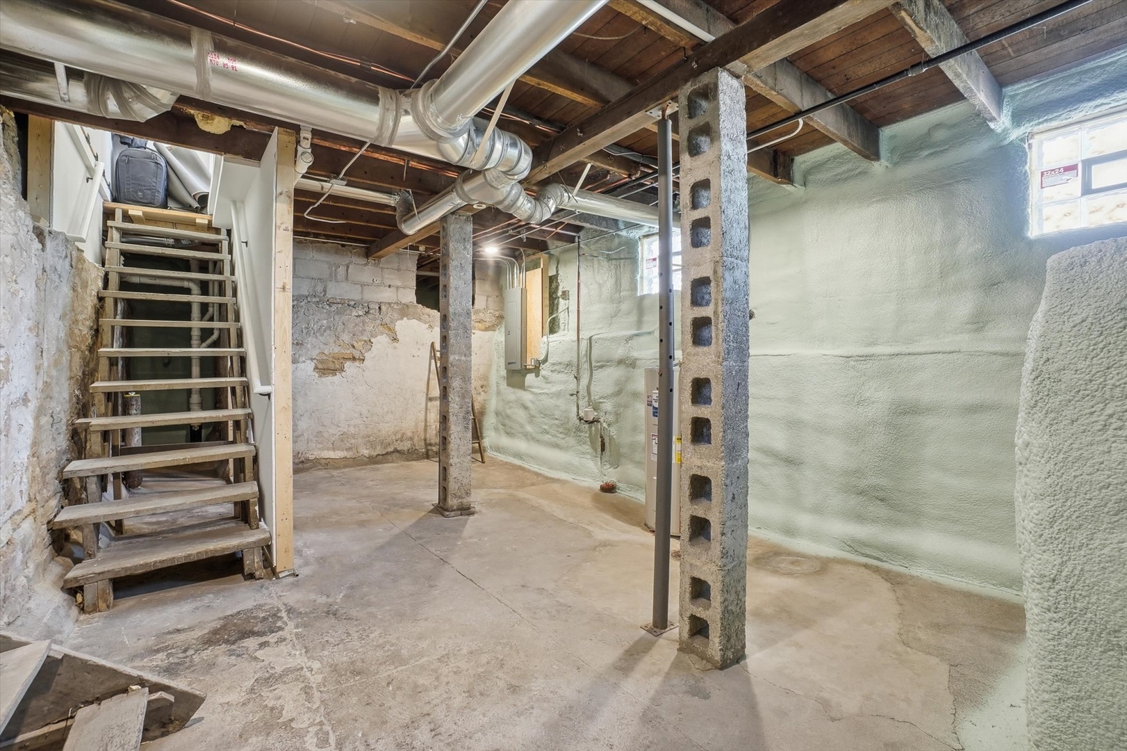 1313 Elizabeth Street Joliet, IL 60435 - Photo 20 of 27 a view of walk in closet with empty racks
