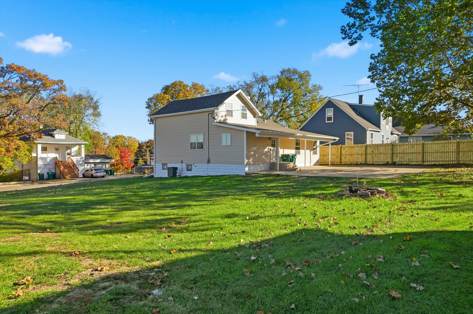 1313 Elizabeth Street Joliet, IL 60435 - Photo 26 of 27 a front view of a house with a yard