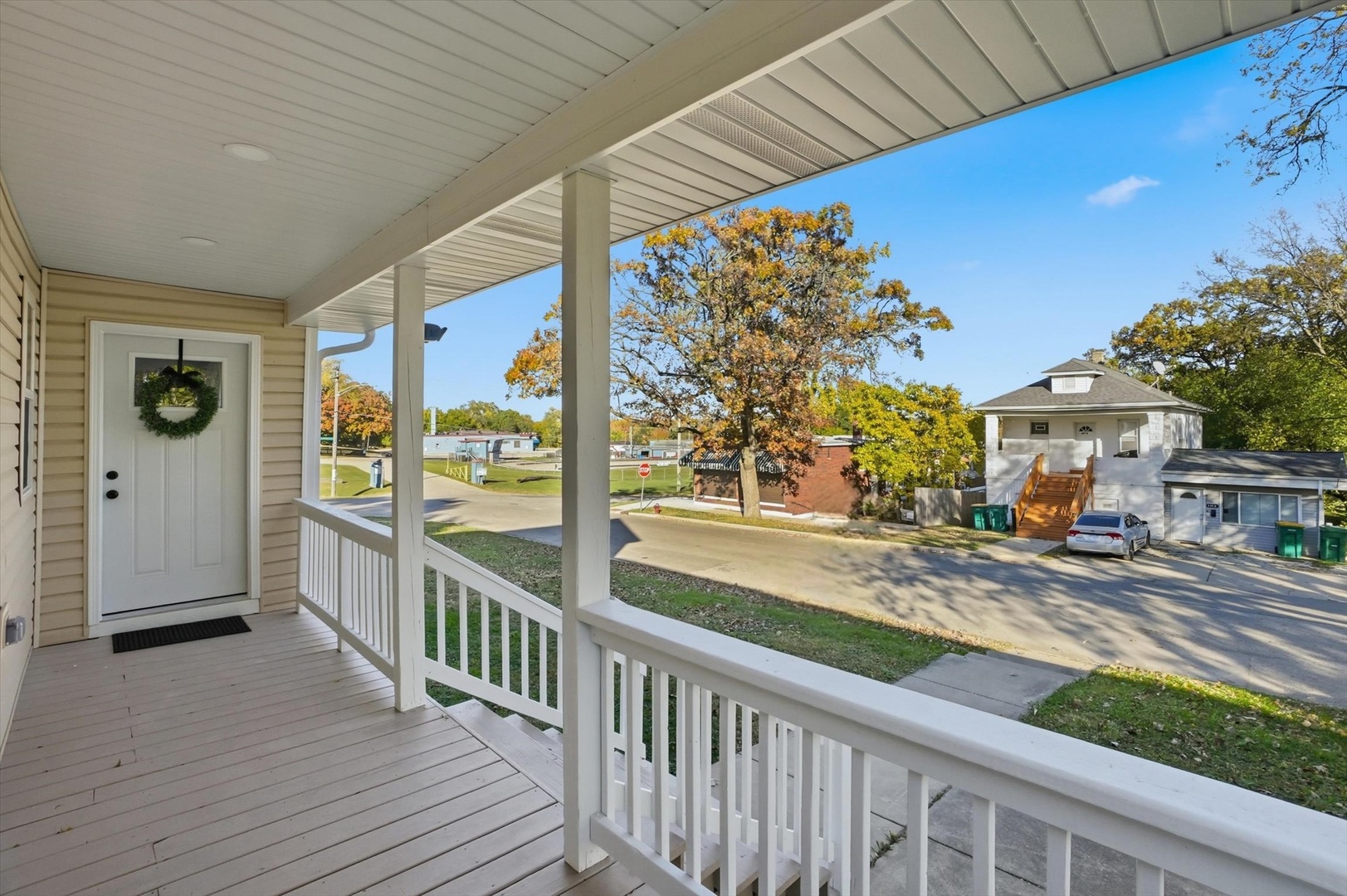 1313 Elizabeth Street Joliet, IL 60435 - Photo 3 of 27 a view of a porch and garden