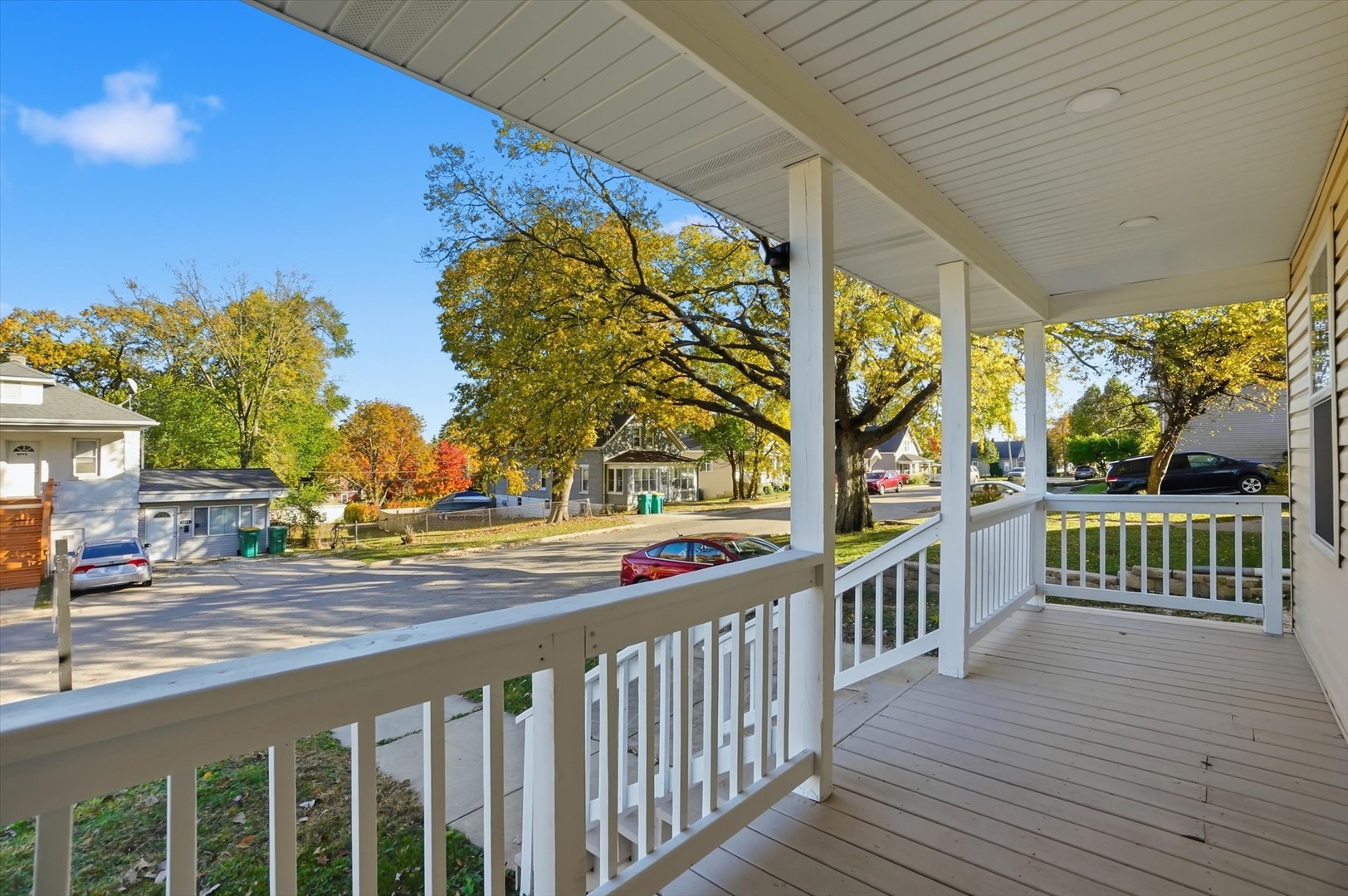 1313 Elizabeth Street Joliet, IL 60435 - Photo 4 of 27 a view of a porch and wooden floor