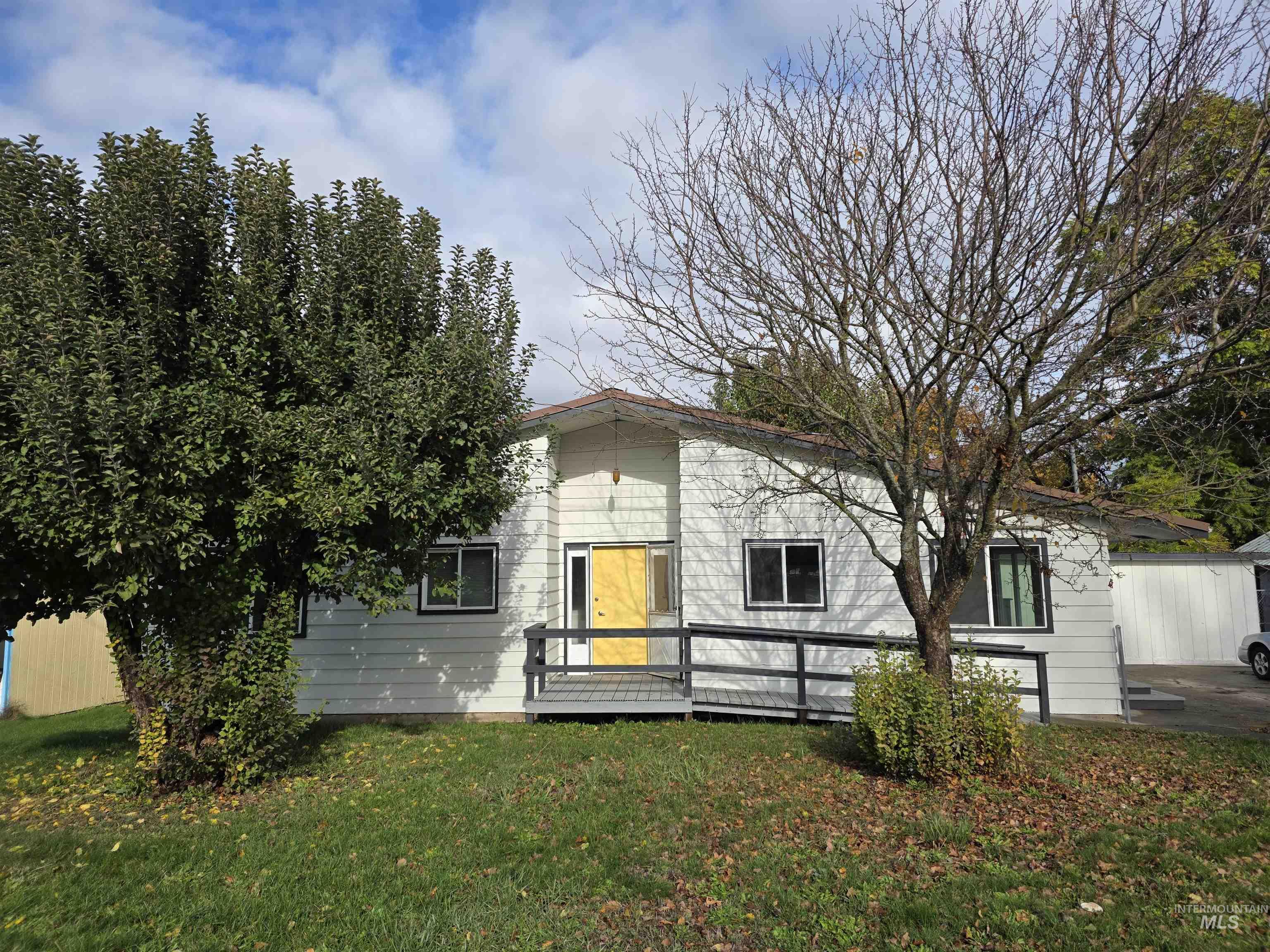 View of front of house with a front lawn