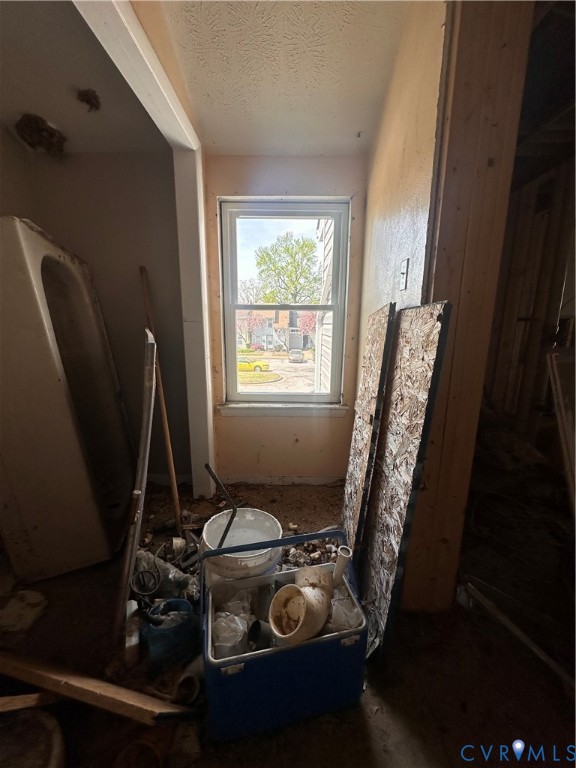 3931 Old Brook Road Richmond, VA 23227 - Photo 17 of 25 a view of a workspace with furniture and a window